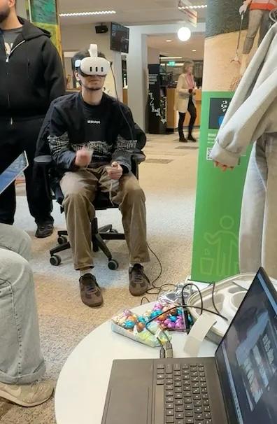 Participant wearing a Meta Quest headset during a VR session at the BMS Lab